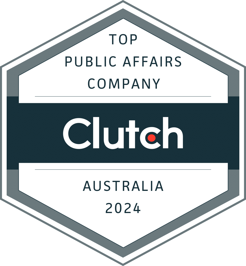 Hexagonal badge with text "Top Public Affairs Company, Clutch, Australia 2024" on a dark and light gray background.
