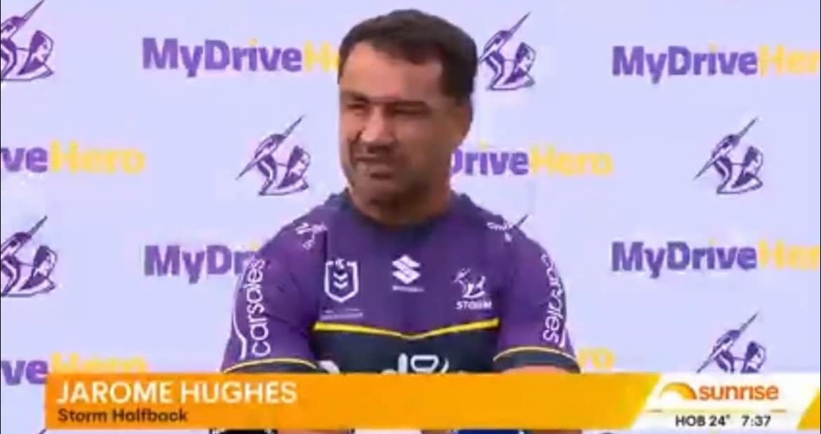 A rugby player in a purple jersey stands in front of a MyDriveHero backdrop; an on-screen label reads 